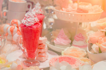 strawberry fruit juice with ice and cream on high glass