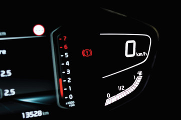 Illustration of side view of illuminated full digital car dashboard panel with speedometer, tachometer, odometer and fuel level gauge in hybrid vehicle. Modern electronic instrument cluster in car.