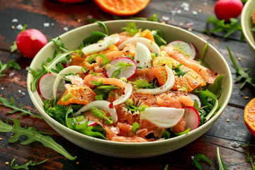 Smoked salmon and fennel salad wild rocket, radishes and sweet clementines