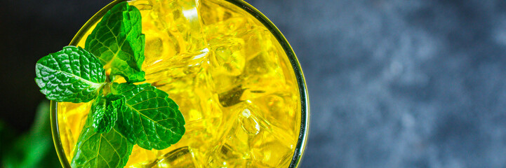 lemonade with ice, lemon and mint, a refreshing drink, menu concept food background. top view. copy space for text