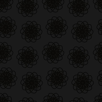 seamless pattern. round symmetrical black floral pattern on a dark gray background