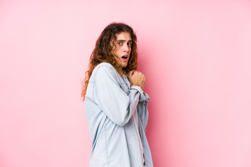 Long hair man posing isolated scared and afraid.