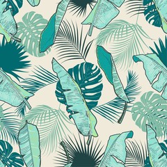 Tropical floral banana palm tree leafs seamless vector pattern