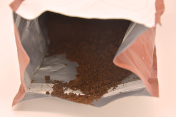 Brazilian ground coffee in a pack on a white background