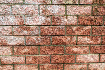 Wet stone brick wall. Exterior home decoration.