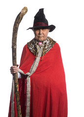 portrait of an old magician on a white isolated background