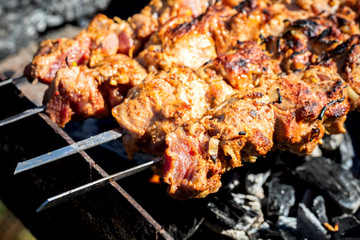 Barbecue. Cooking Shish kebab meat on the grill. Street food.