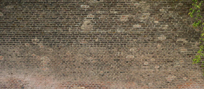 Textur einer Ziegelsteinmauer einer alten Festung