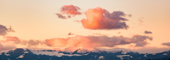 Styrian alps covered with snow landscape. View at mountain chain near Graz city.