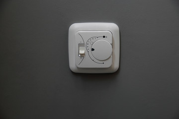 white light switch on grey background, interior, style