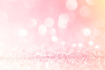 Fototapeta na wymiar Pink gold, pink bokeh,circle abstract light background,Pink Gold shining lights, sparkling glittering Valentines day,women day or event lights romantic backdrop.Blurred abstract holiday background.