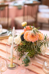 Elegant decor of a wedding bank in peach and green