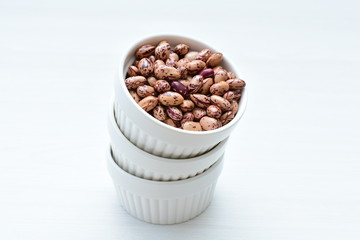 Raw bean grains (Phaseolus vulgaris) displayed in bowl