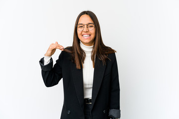 Young mixed race business woman isolated on white background laughing about something, covering mouth with hands.