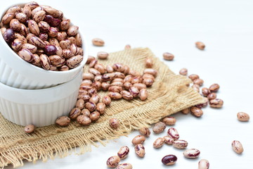 Raw bean grains (Phaseolus vulgaris) displayed in bowl