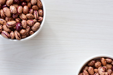 Raw bean grains (Phaseolus vulgaris) displayed in bowl