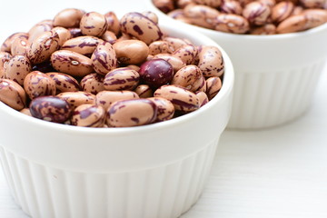 Raw bean grains (Phaseolus vulgaris) displayed in bowl