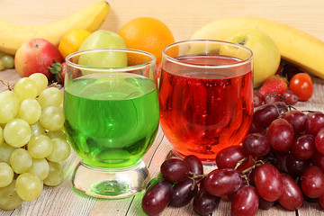 Fruit cocktail, cider, grape juices or fruit drinks in glasses and ingredients on a sunny table. The concept of detox diet and weight loss, healthy and natural nutrition, bar. Healthy breakfast, 