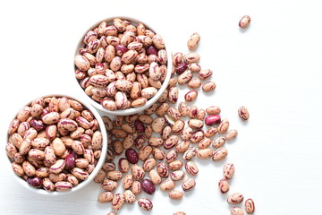 Raw bean grains (Phaseolus vulgaris) displayed in bowl
