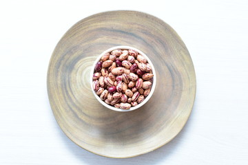 Raw bean grains (Phaseolus vulgaris) displayed in bowl