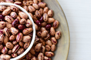 Raw bean grains (Phaseolus vulgaris) displayed in bowl