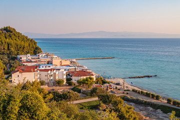 Fototapeta na wymiar Kallithea, Greece - September 03,2019: Top view of Kallithea, Halkidiki in Greece. Panoramic view of famous and idyllic beach of Kalithea resting 