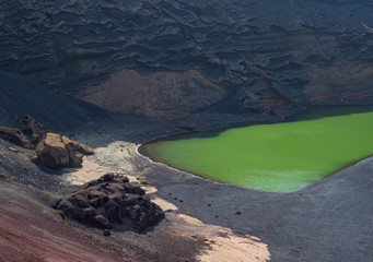 The Green Lake on volcanic black beach El Golfo, island Lanzarote