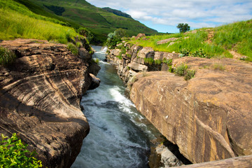 Naklejka na ściany i meble rapids of mnweni river, northern drakensberg mountains, kwazulu natal, south africa