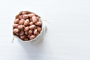 Raw bean grains (Phaseolus vulgaris) displayed in bowl