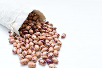 Raw bean grains (Phaseolus vulgaris) displayed in bowl