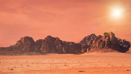 Papier Peint photo Lavable Orange Planète Mars comme paysage - Photo du désert de Wadi Rum en Jordanie avec filtre de couleur rouge et soleil ajouté, cet endroit a été utilisé comme décor pour de nombreux films de science-fiction