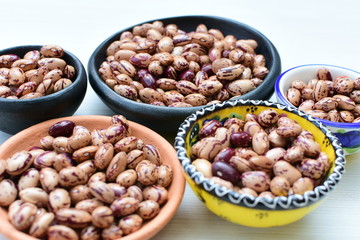 Raw bean grains (Phaseolus vulgaris) displayed in bowl