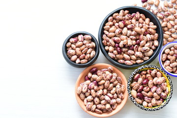 Raw bean grains (Phaseolus vulgaris) displayed in bowl