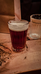 faceted glass of beer
