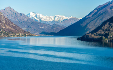 Landscape of Lake Lugano with Swiss alps.