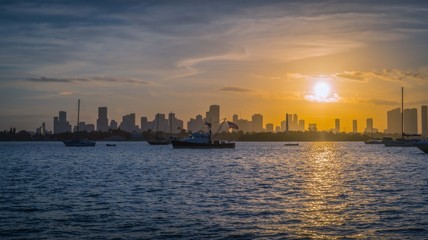 city sunset miami florida buildings boats sea ocean water panorama landscape sky skyscraper silhouette downtown dusk panoramic blue yellow