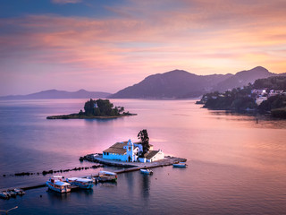 Mouse Island Corfu Greece showing the Byzantine church of Panogia Viacherna and the small fishing...