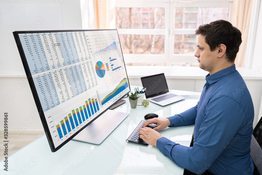 Poster Businessman Analyzing Graphs On Computer