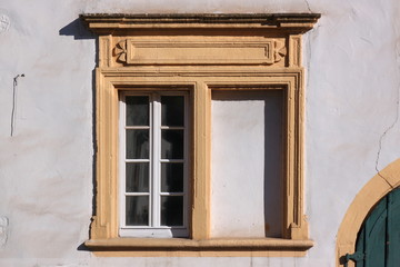 Renaissance frame with blind window at the Amtshaus building facade in the old town of Trier Pfalzel in Germany
