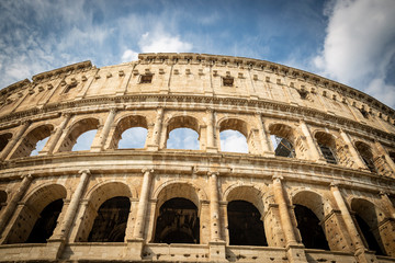 Naklejka premium the famous Coliseum of Rome (Colosseum - aka Flavian Amphitheatre), Lazio, Italy