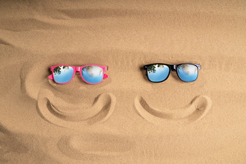 Sunglasses On Sand At Beach
