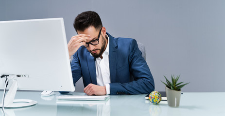 Man Suffering From Headache
