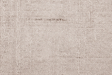 Brown linen fabric texture or background.