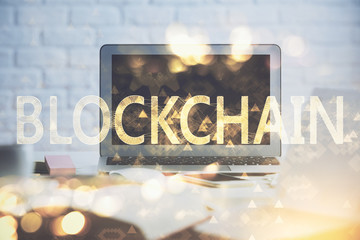 Multi exposure of blockchain and crypto economy theme hologram and table with computer background....