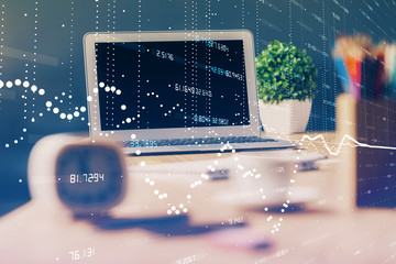 Double exposure of desktop computer and technology theme hologram. Concept of software development.