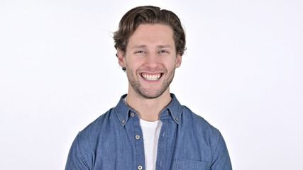 Young Man Smiling at the Camera on White Background