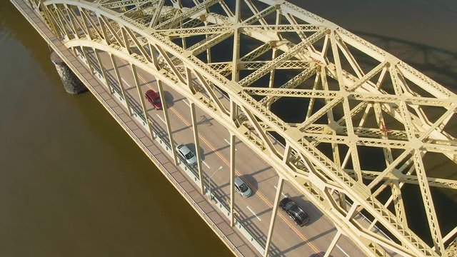 Aerial: Allegheny River & traffic on 16th Street Bridge in downtown Pittsburgh, Pennsylvania, USA. 