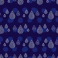 Vector blue shibori teardrop rows with background dots seamless pattern. Suitable for textile, gift wrap and wallpaper.