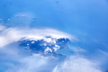 Naklejka na ściany i meble Clouds seen from an airplane.