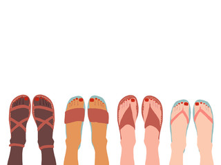 Fototapeta women's feet wearing summer sandals obraz
